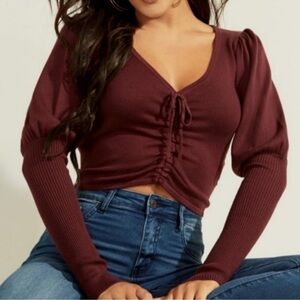 Guess burgundy Sweater cropped. Drawstrings front ribbed pullover.Size M